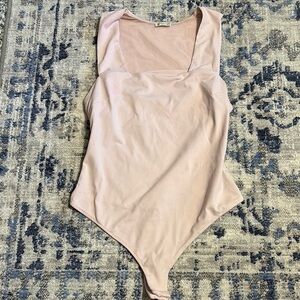 Free People Pink Bodysuit with High-Cut Leg